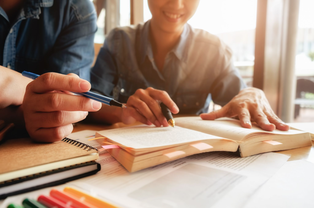 What MCAT Prep Really Costs & How to Prep Well Without Overpaying 2 Premed students studying together for the MCAT.